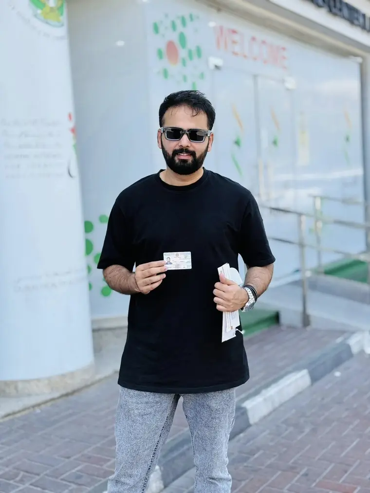 Soban Tariq holding his UAE Golden Visa